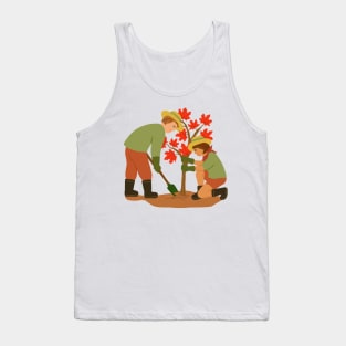 Young couple planting red maple tree. Outdoors gardening concept. Tank Top